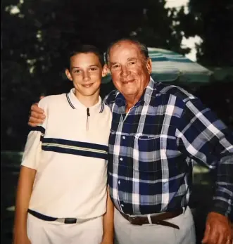 Bruce Franse with his grandfather after Bruce’s eighth-grade graduation